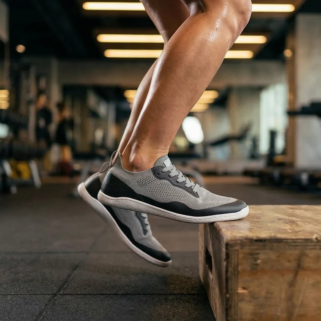files/kenaz-gris-uso-mujer-gym.webp