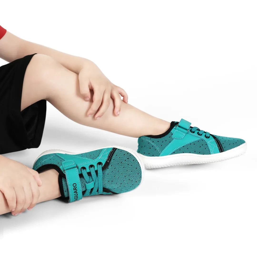Calzado barefoot Saguaro verde  en niño, cero drop y flexible.