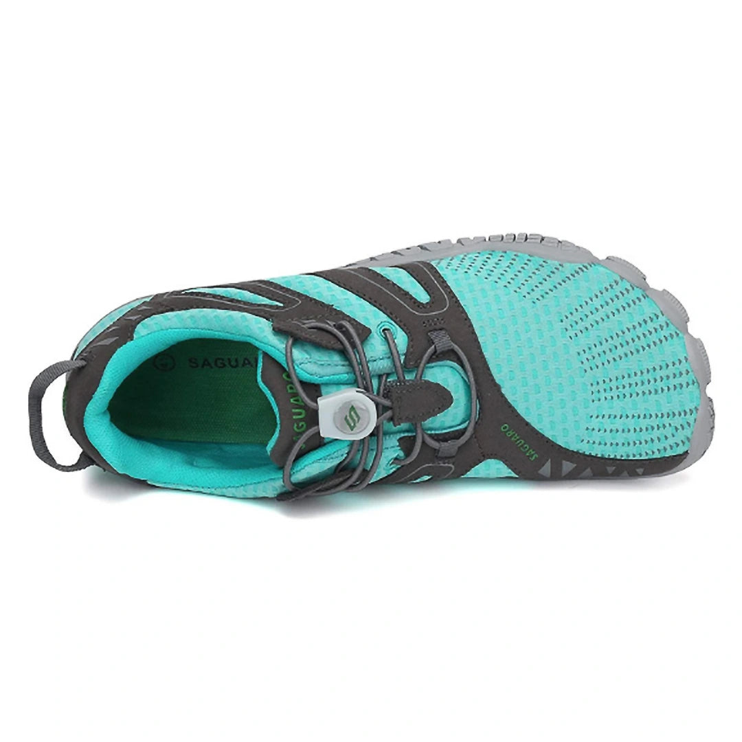 Zapatillas Vitality IV turquesa vista superior mostrando tejido respirable minimalista.